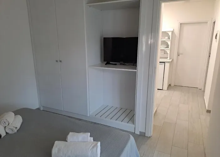 Le Roccette Mare & Restaurant מלון דירות 3*