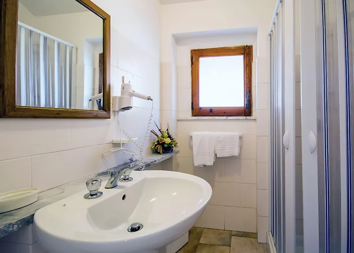 Le Roccette Mare & Restaurant מלון דירות 3*